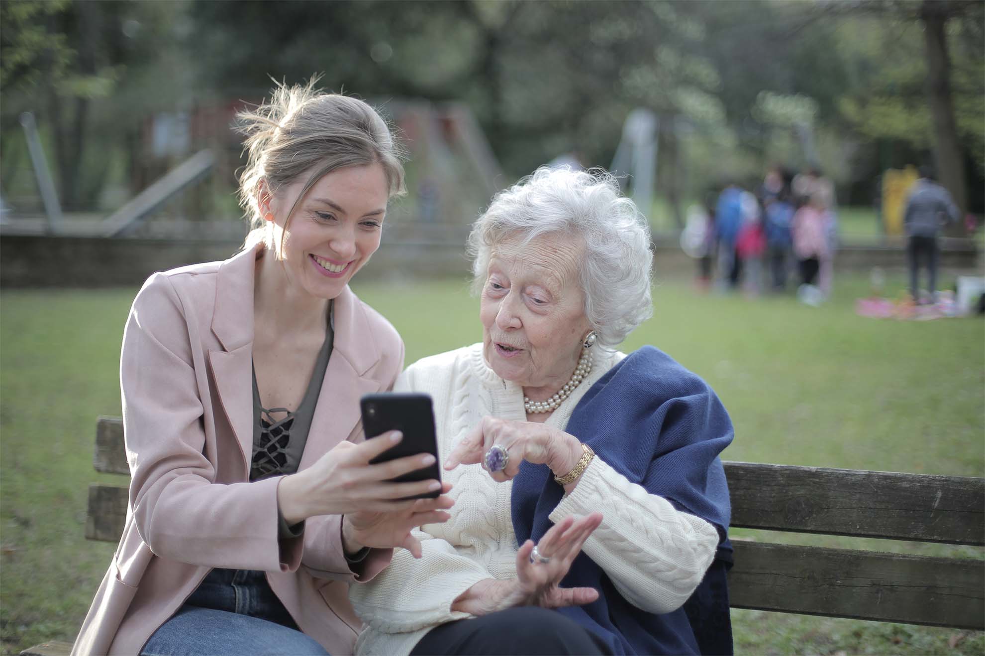 resident sitting with a young lady