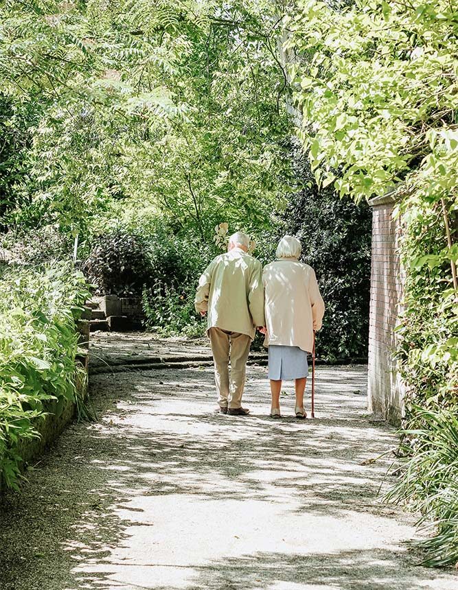 residents walking in the garden